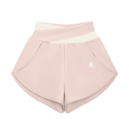 YA TOUR Women's Tennis Panelled Shorts – Light Pink with Apricot crossover color block waistband, front flat lay showing high-waist design, inner liner and overlay construction