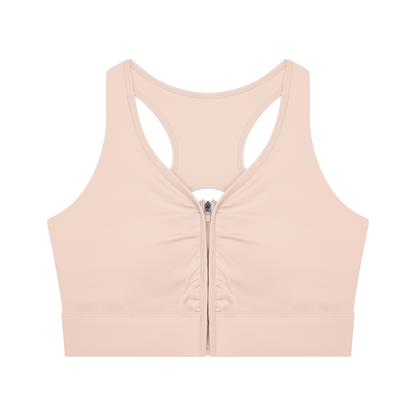 YA TOUR Women's Cropped Zip Sports Bra blush pink — front view showing front zip closure and racerback silhouette