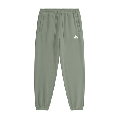YA TOUR Unisex Heavyweight Fleece Joggers – Grayish Green, front flat lay showing mid-rise elastic waistband with drawstring, side pockets, tapered cuff and YA TOUR logo