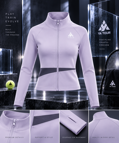 YA TOUR Women's Paneled Tennis Jacket – Light Purple with Deep Purple panel, editorial studio product shot showing stand collar, full-zip closure, diagonal panel construction and YA TOUR logo on chest alongside detail close-ups of zipper, panel seam, thumb hole cuff and collar, with YA TOUR tennis ball and racket as props