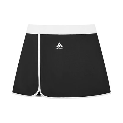 YA TOUR Women's Color Block A-Line Skort black and white — front view with YA TOUR logo and white contrast waistband