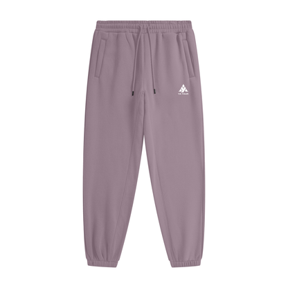 YA TOUR Unisex Heavyweight Fleece Joggers – Ash Purple, front flat lay showing mid-rise elastic waistband with drawstring, side pockets, tapered cuff and YA TOUR logo