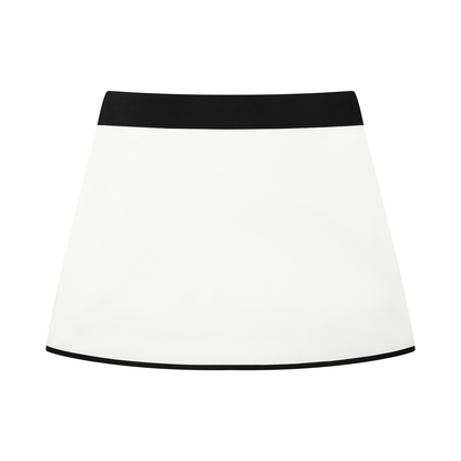 YA TOUR Women's Color Block A-Line Skort white and black — back view showing black contrast hem trim and clean silhouette