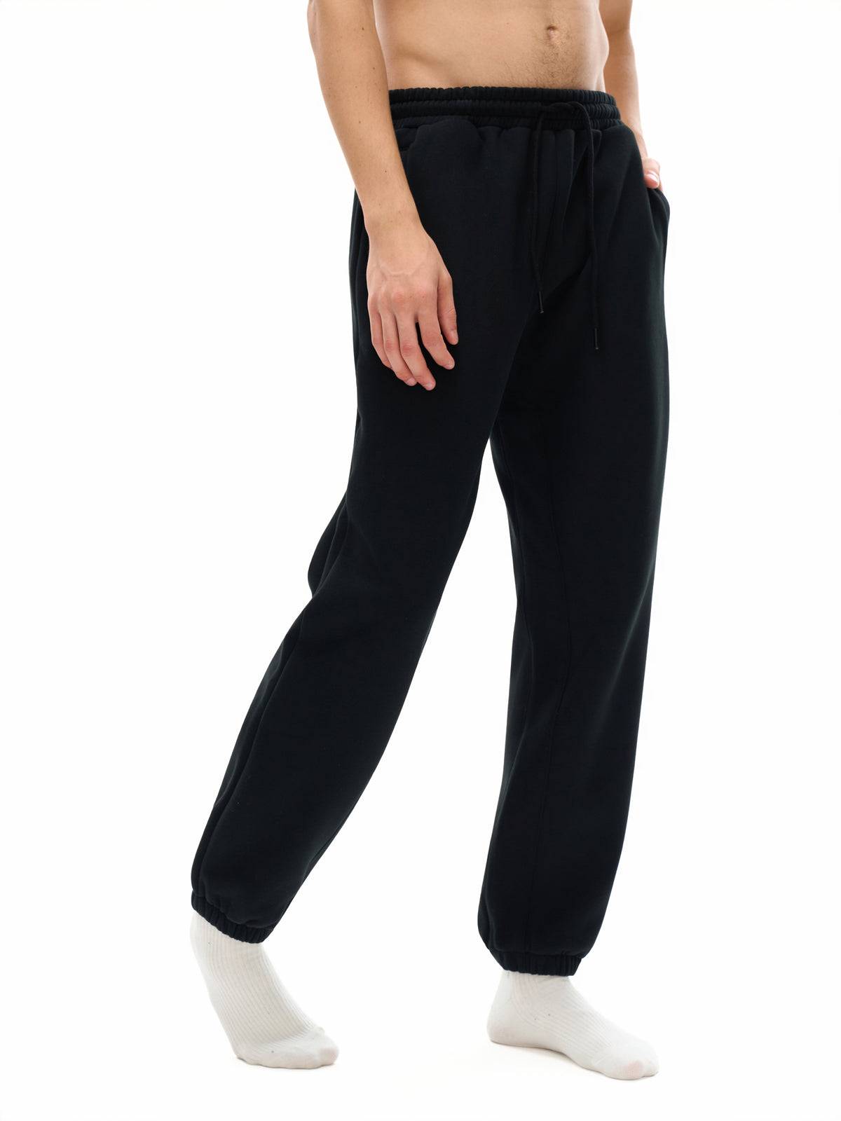 YA TOUR Unisex Heavyweight Fleece Joggers – on-model front view showing relaxed unisex fit, mid-rise waistband and tapered jogger silhouette