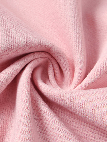 YA TOUR Kid's Solid Crewneck T-Shirt – Light Pink, macro close-up of 57.3% polyester 36.9% cotton 5.8% spandex fabric showing soft mid-weight knit texture