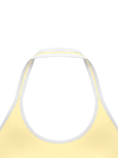 YA TOUR Women's Halter Color Block Sports Bra – Light Yellow, close-up of halter tie back and color block underbust band construction