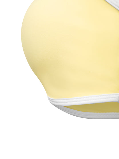 YA TOUR Women's Halter Color Block Sports Bra – Light Yellow, close-up of built-in cup pad shape and polyamide-elastane fabric texture