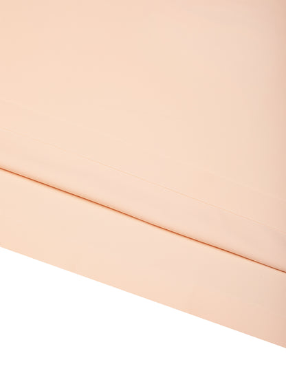 YA TOUR Men's Lightweight Performance T-Shirt – Peach/Apricot, close-up of straight hem showing double-stitch construction and clean finish 