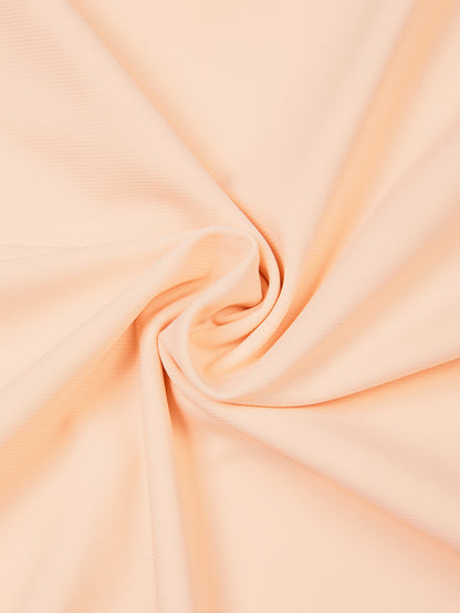 YA TOUR Men's Lightweight Performance T-Shirt – Peach/Apricot, close-up of lightweight nylon-spandex fabric showing soft draped texture