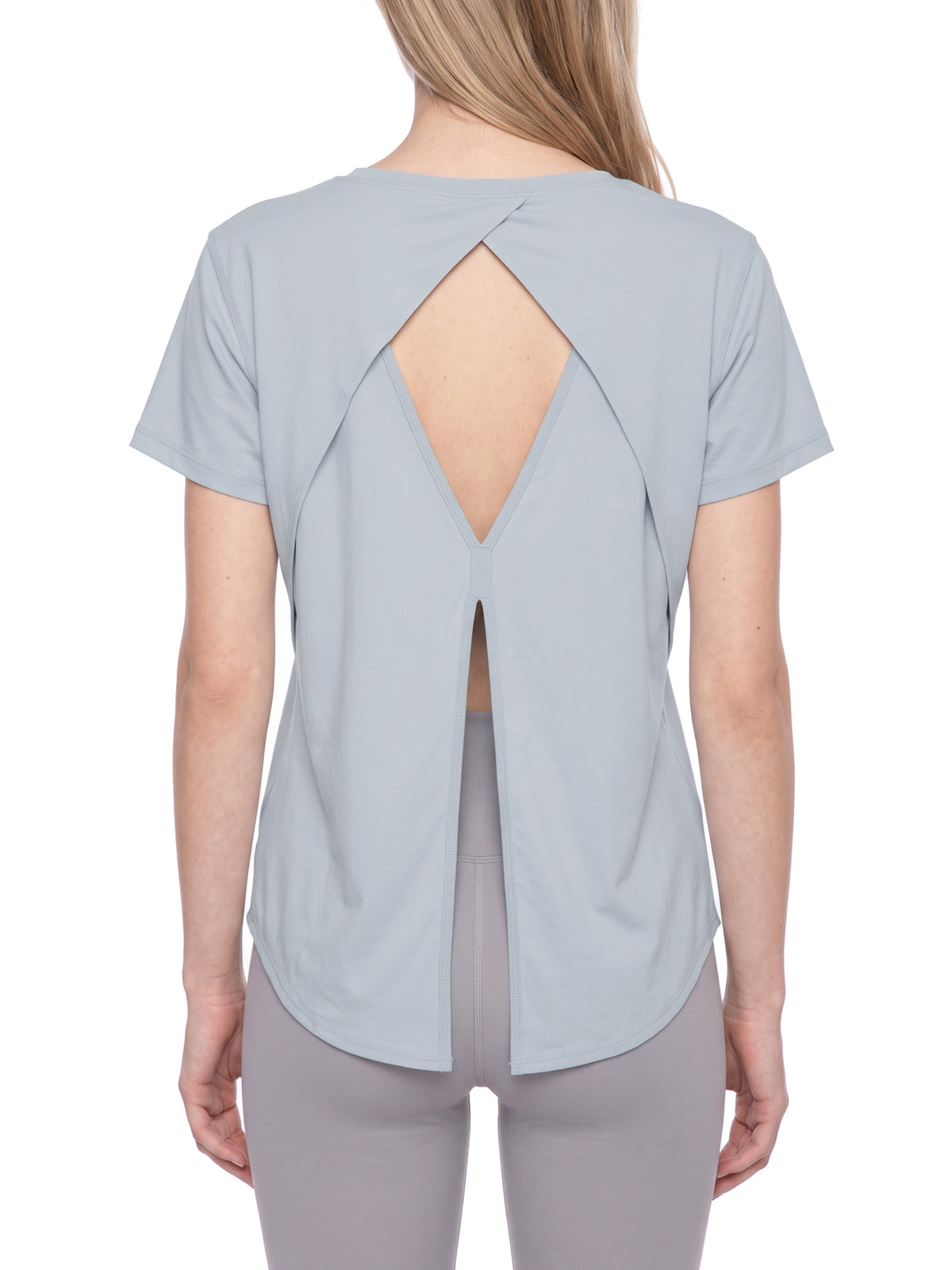 YA TOUR Women's Raglan Training T-Shirt – Gray Blue, back view on model showing open diamond cutout