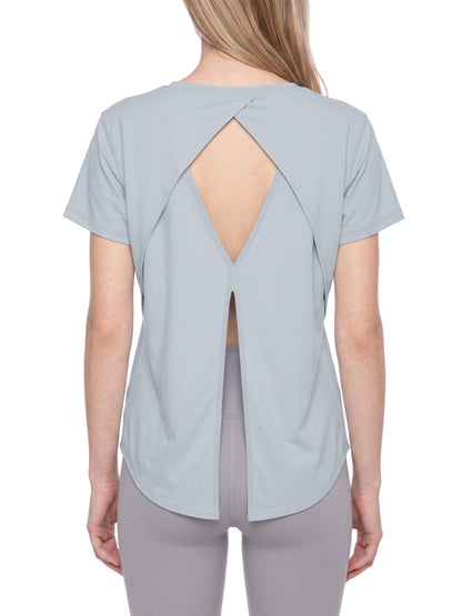 YA TOUR Women's Raglan Training T-Shirt – Gray Blue, back view on model showing open diamond cutout