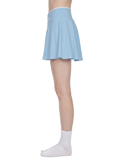 YA TOUR Women's Color Block A-Line Skirt – Sky Blue, on-model side view showing A-line length and white color block waistband trim