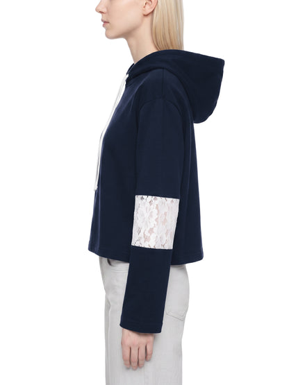 YA TOUR Women's Cropped Lace-Panel Hoodie – Navy Blue, on-model side view showing cropped length, lace panel on sleeve, drawstring hood and straight cuffs