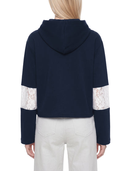 YA TOUR Women's Cropped Lace-Panel Hoodie – Navy Blue, on-model back view showing cropped boxy silhouette, lace panel on both sleeves and structured hood