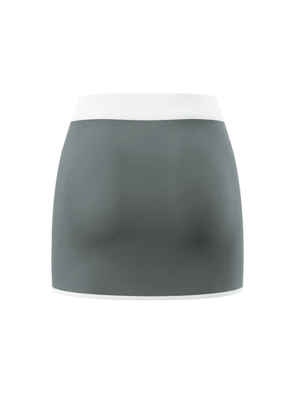 YA TOUR Women's Color Block A-Line Skort dark gray and white — back view showing white contrast hem trim and clean silhouette