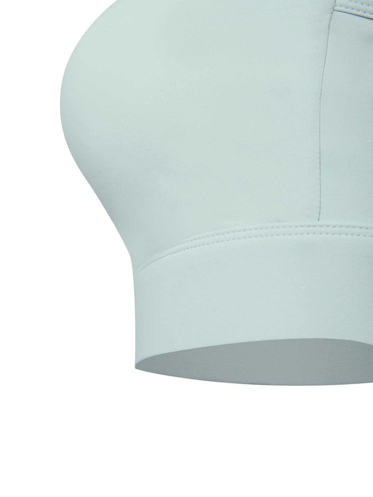 YA TOUR Women's Cropped Zip Sports Bra mint green — close-up of elastane hem band and fabric quality detail
