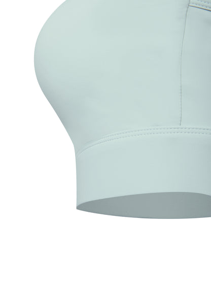 YA TOUR Women's Cropped Zip Sports Bra mint green — close-up of elastane hem band and fabric quality detail