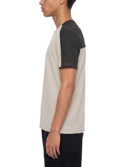 YA TOUR Men's Color Block Performance T-Shirt – Beige / Dark color block, on-model side view showing crew neck, short sleeves with contrast color block panels and athletic fit