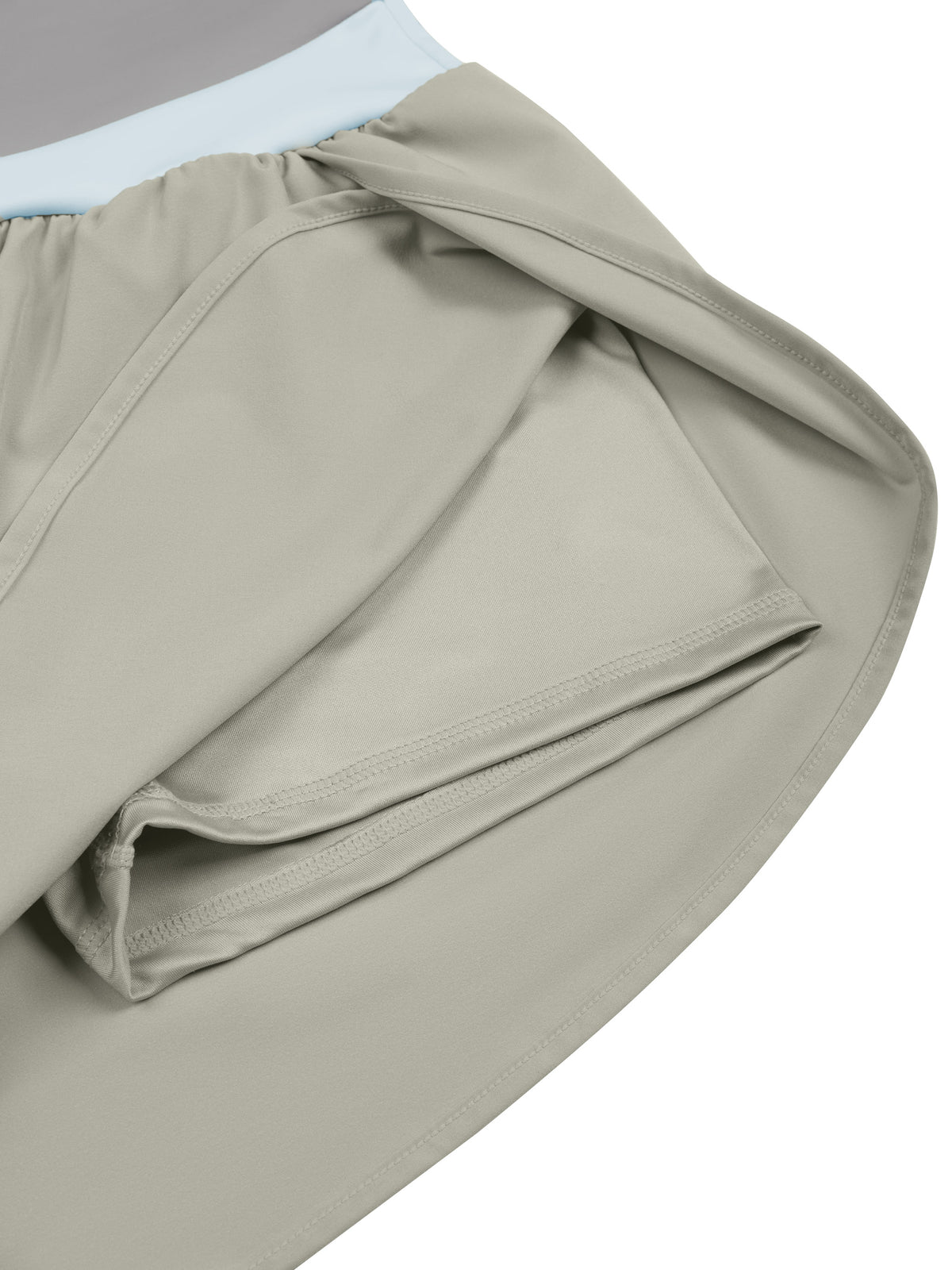 YA TOUR Women's Tennis Panelled Shorts – Light Gray with Light Blue, close-up of inner liner and overlay hem construction showing dual-layer detail