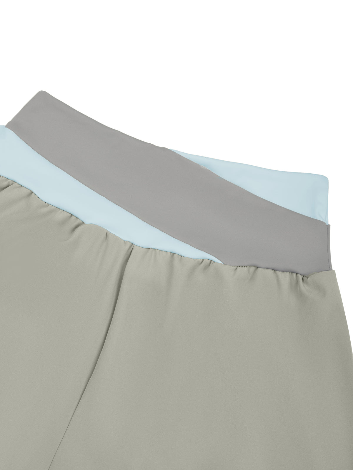 YA TOUR Women's Tennis Panelled Shorts – Light Gray with Light Blue, close-up of crossover color block waistband showing panel construction and high-waist fit