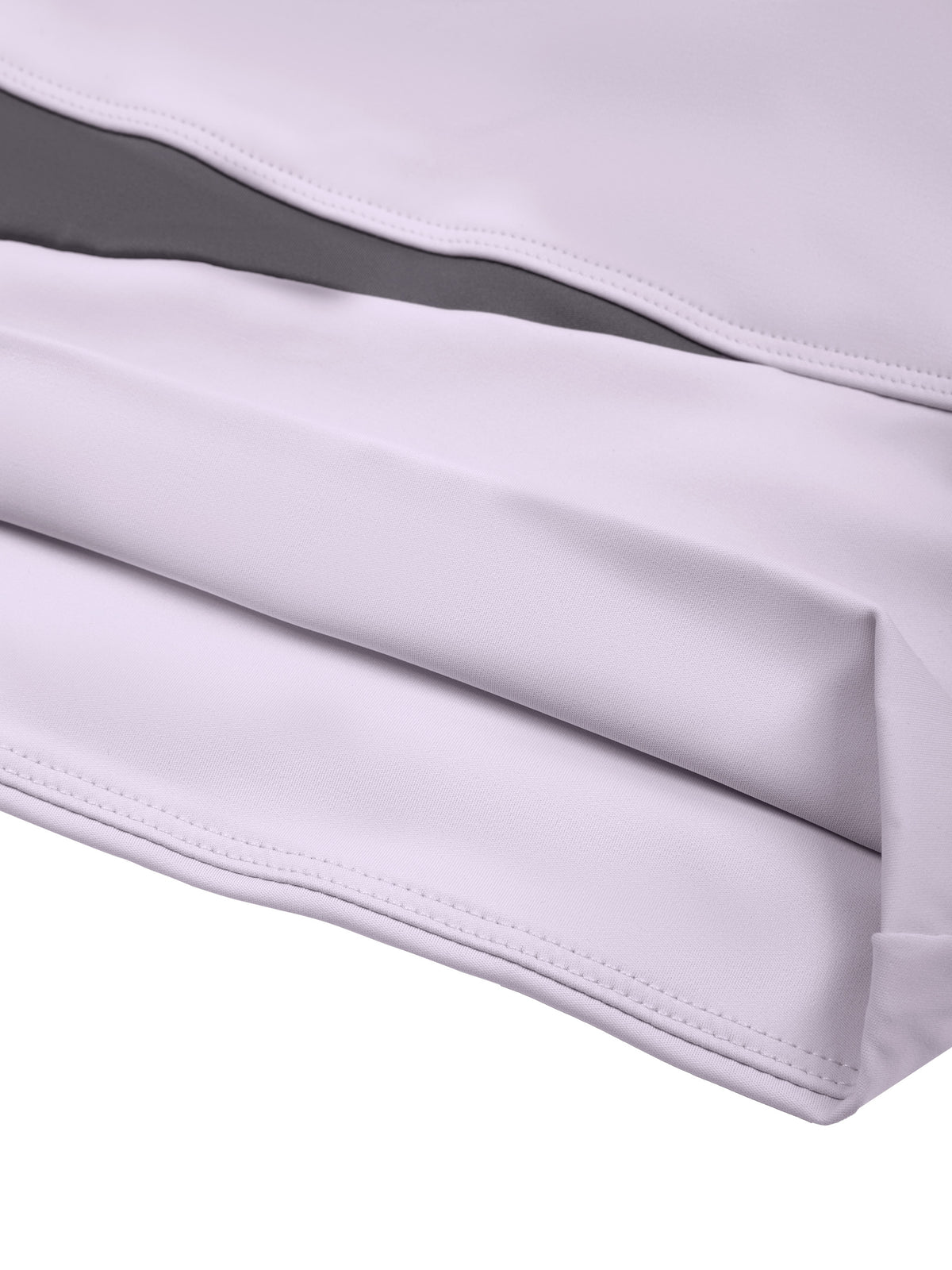YA TOUR Women's Panelled Long Sleeve Tennis T-Shirt – Light Purple with Deep Purple, close-up of diagonal panelled hem construction