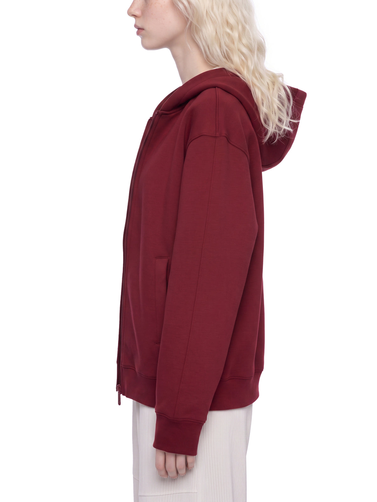 YA TOUR Drop Shoulder Full Zip Hoodie – Burgundy, on-model side view showing drop shoulder cut, full-zip closure, hood and relaxed athletic fit