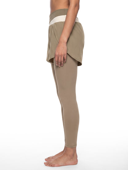 YA TOUR Women's Paneled High Waisted Shorts – Light Gray with Light Yellow, side view on model